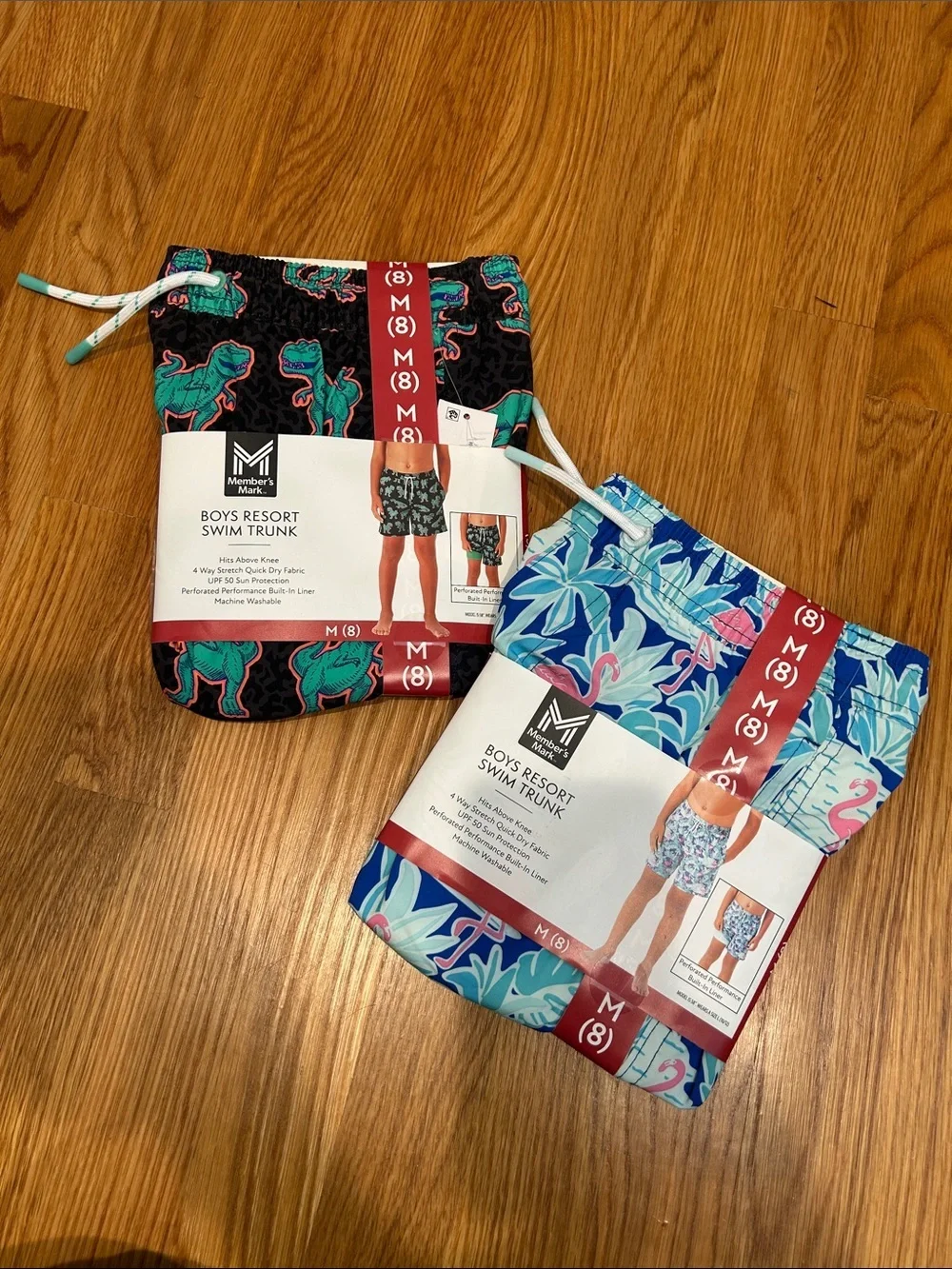Member’s Mark Boys Resort Swim Trunk size 8 dinosaur black / flamingo blue print